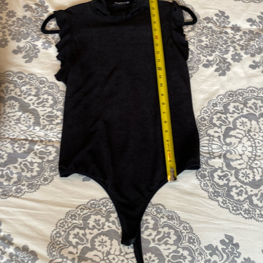 Bebe women’s black thing body suit.